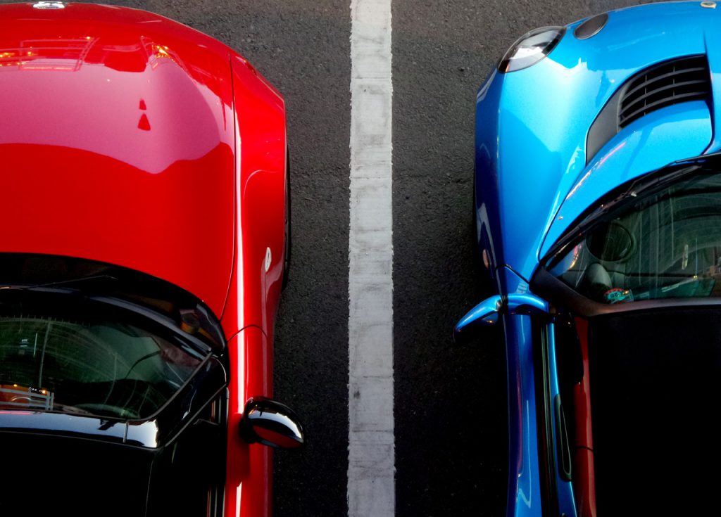 Two cars side by side to illustrate blog about industrial insulation in the automotive industry