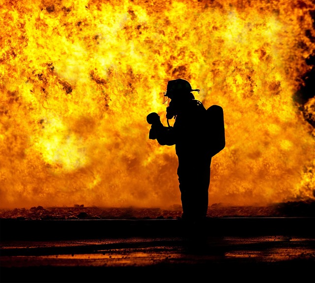high temperature for fire protection, image of a fire fighter in front of a fire.