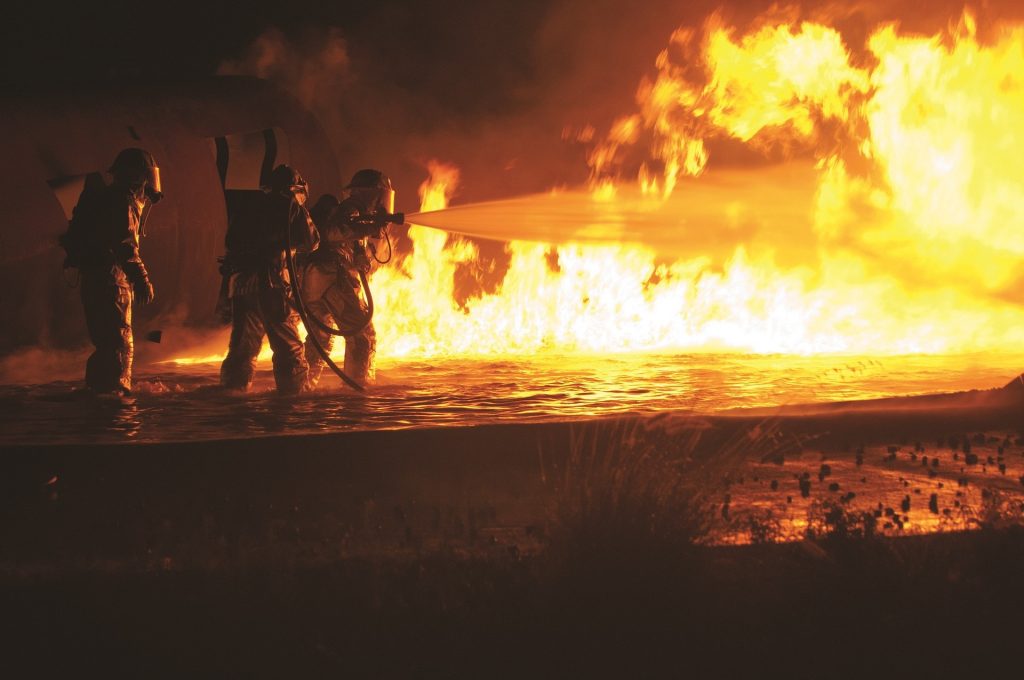 image of firefighters fighting a blaze for blog by Elmelin about the properties of Elmtherm